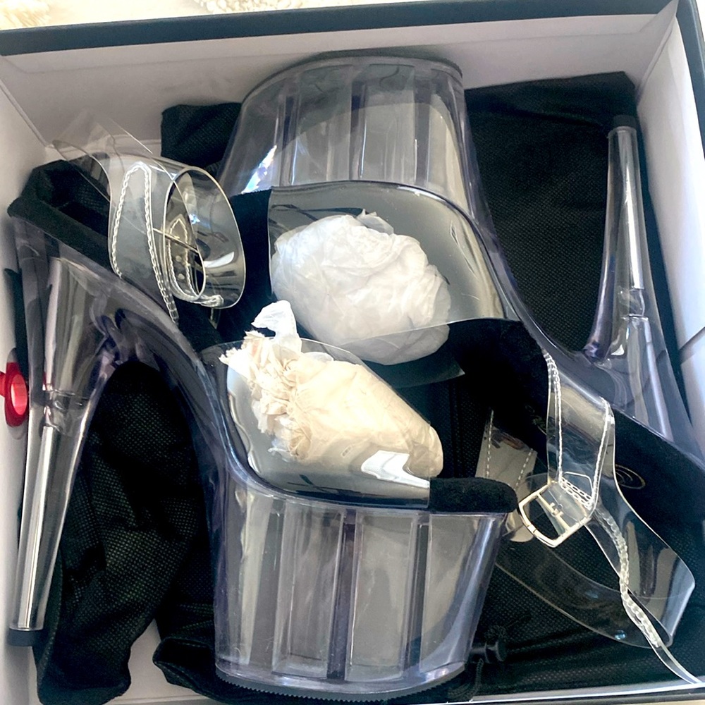Clear stiletto platform High heels by Pleaser. Never been worn. Brand new.